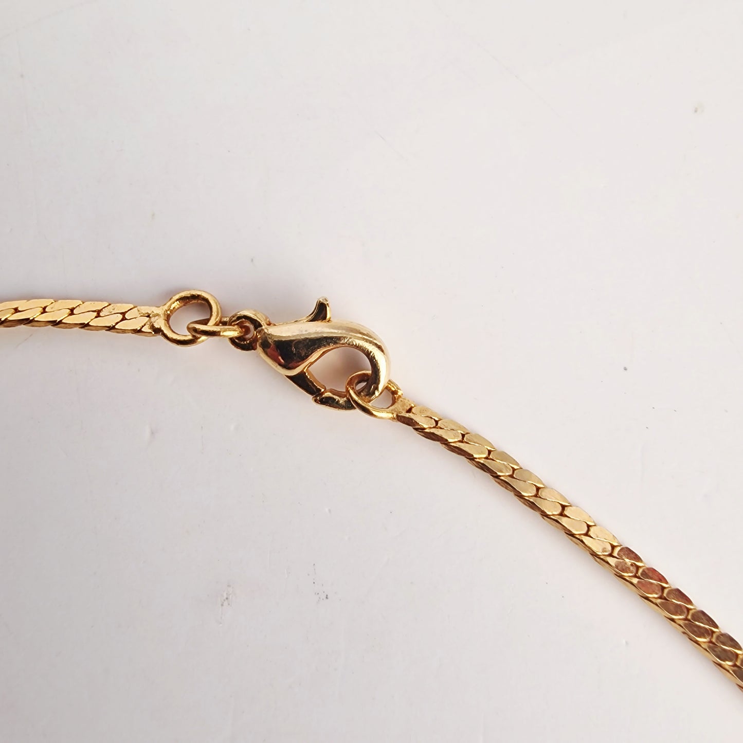 Vintage 1980s Gold-Tone Herringbone Chain Necklace Red Rhinestone Drop Pendant – photo 6