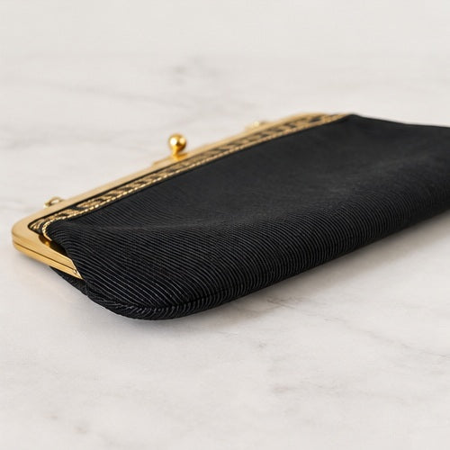 Vintage black evening bag slim side profile