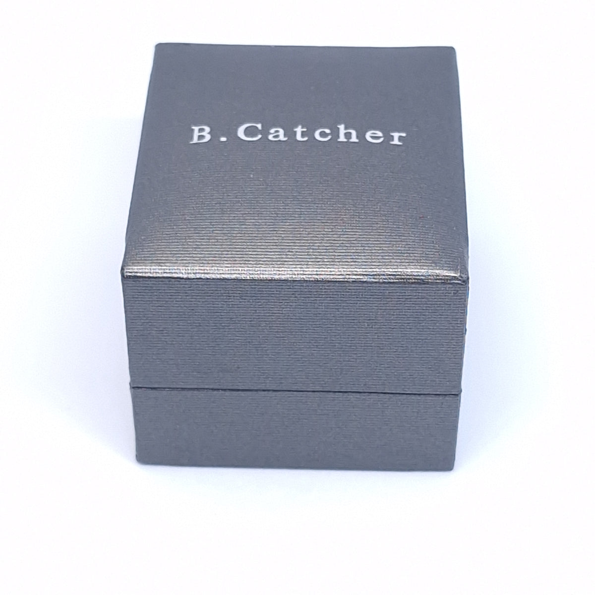 Closed dark grey presentation box printed B.Catcher in white lettering