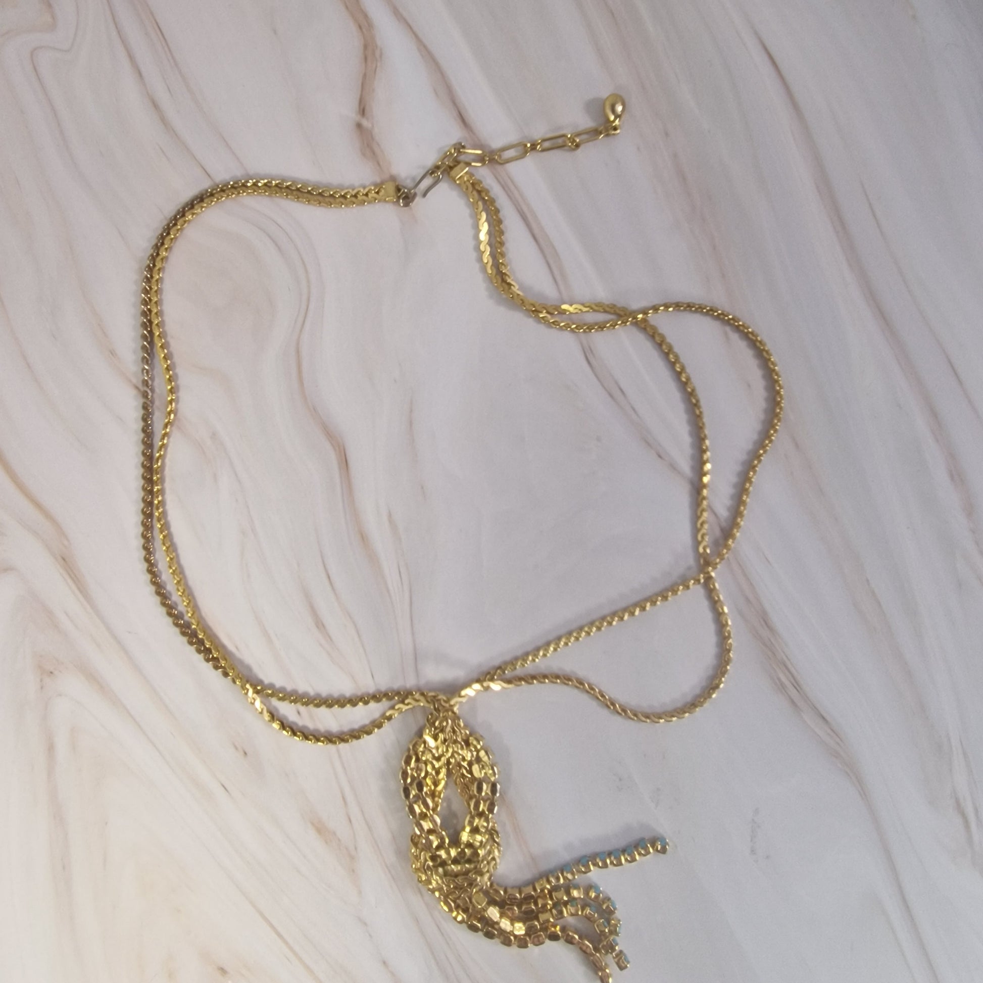 1970s Gold-Tone Rhinestone Knot Pendant Necklace, Turquoise Aqua Crystal Tassel, Retro Costume Jewelry, Statement Lariat, 70s Boho – photo 3