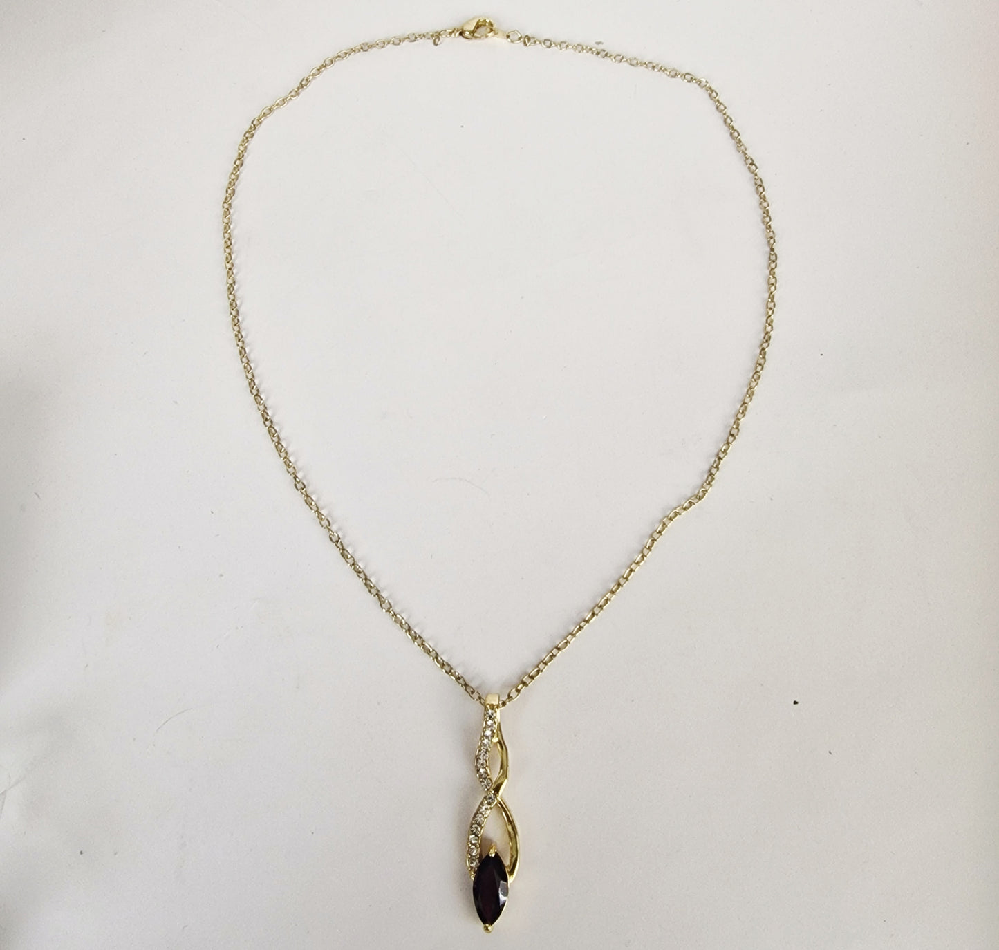 Vintage 1990s Gold-Tone Pendant Necklace Purple Rhinestone Geometric Twist Drop – photo 3