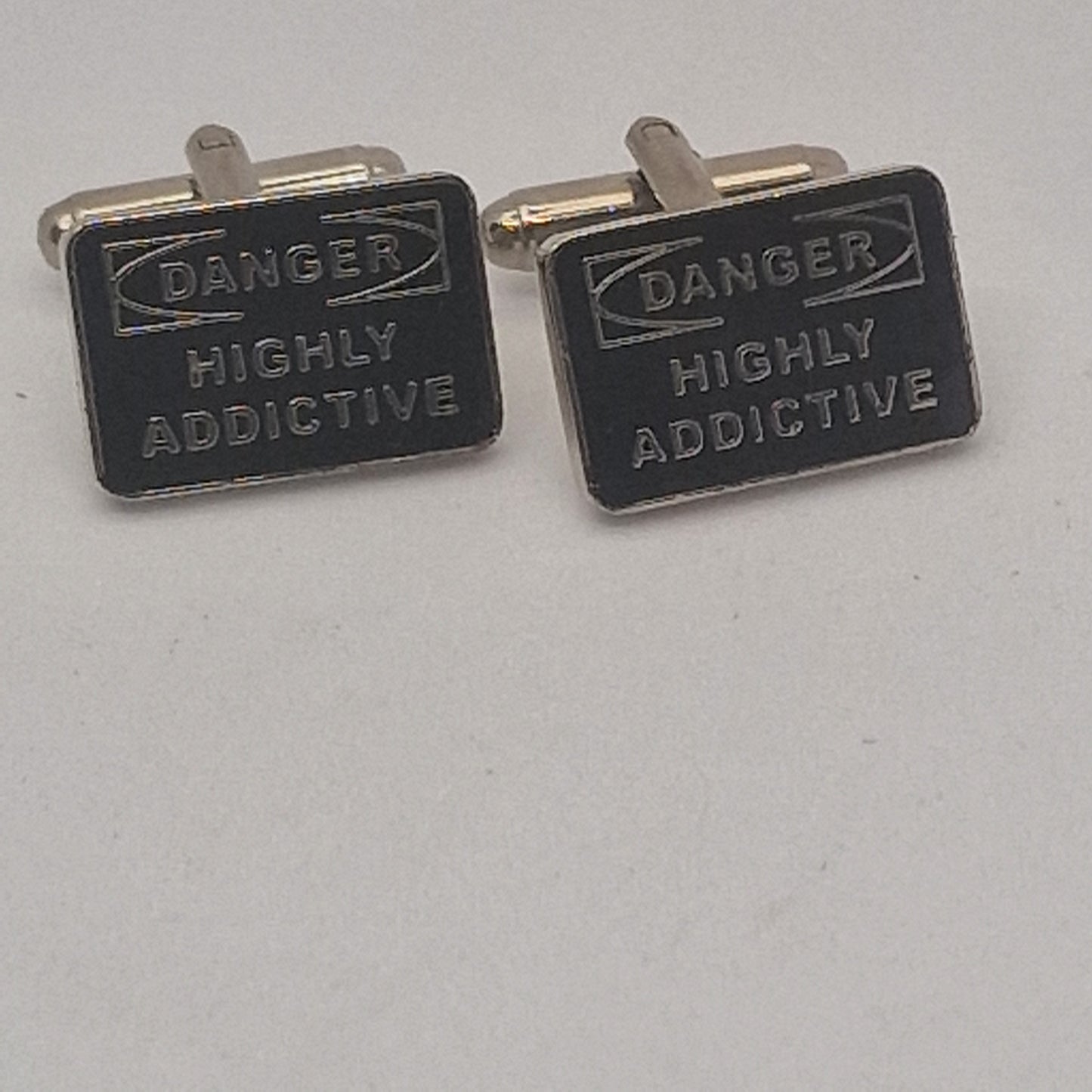 Vintage 1980s Silver-Tone Black Enamel Novelty Cufflinks Danger Highly Addictive