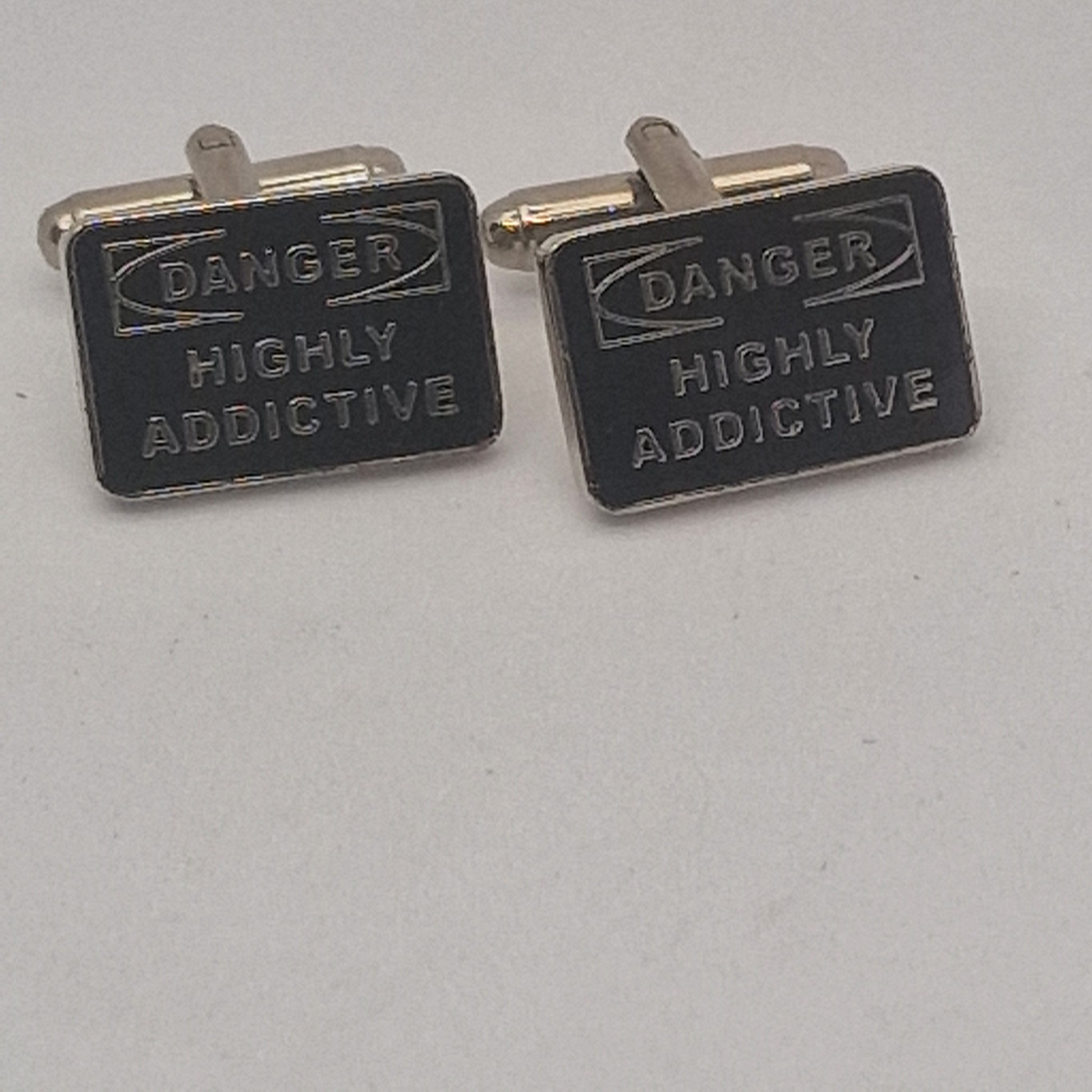 Vintage 1980s Silver-Tone Black Enamel Novelty Cufflinks Danger Highly Addictive