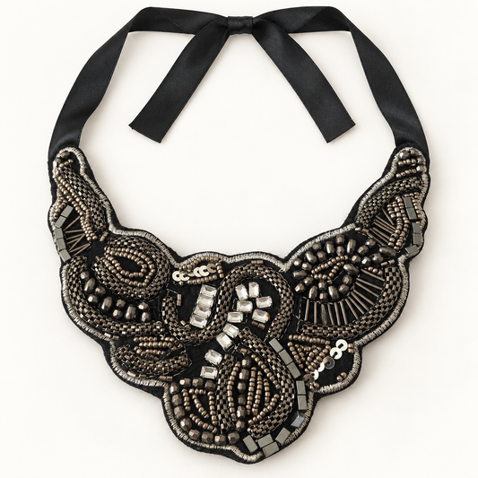 Women's black and silver embellished bib statement necklace with black ribbon tie