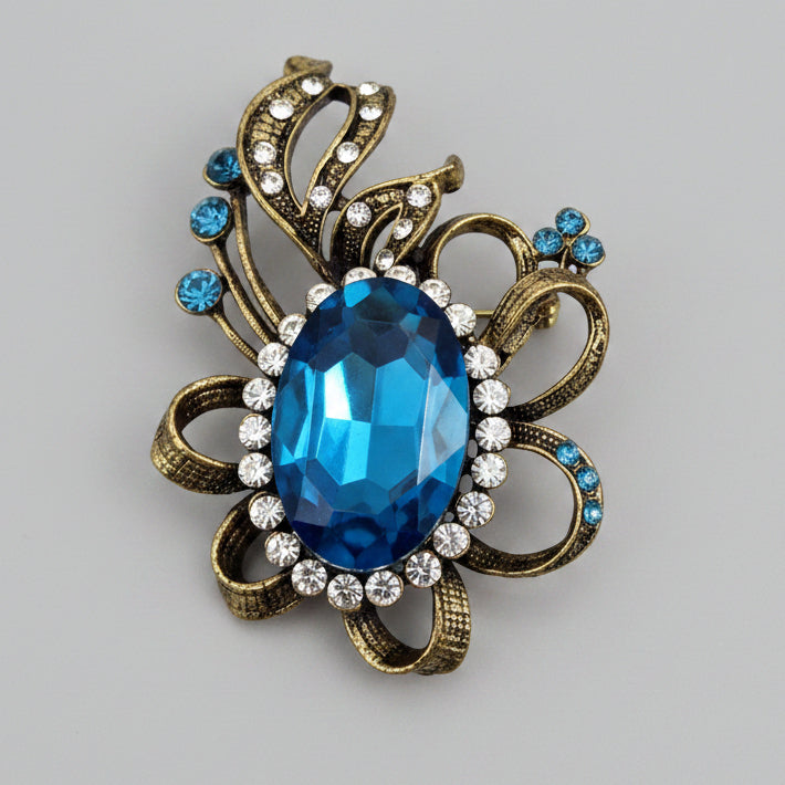 Vintage Blue Stone Brooch Gold-Tone Abstract Scrollwork Signed Pin