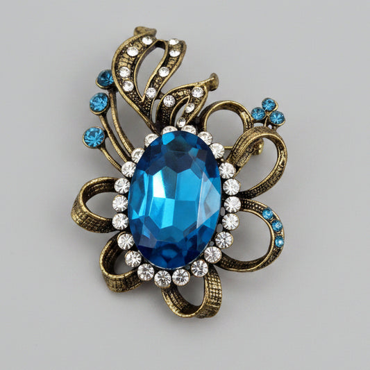 Vintage Blue Stone Brooch Gold-Tone Abstract Scrollwork Signed Pin