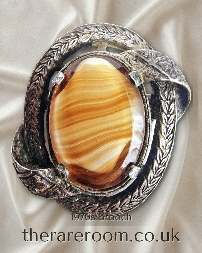 Vintage Miracle 1970s Bronze-Tone Celtic Brooch Agate Cabochon Interlaced Pin — instagram