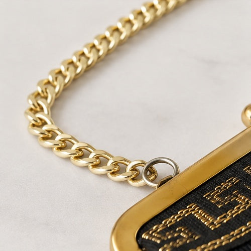 Vintage evening bag gold-tone chain and frame detail