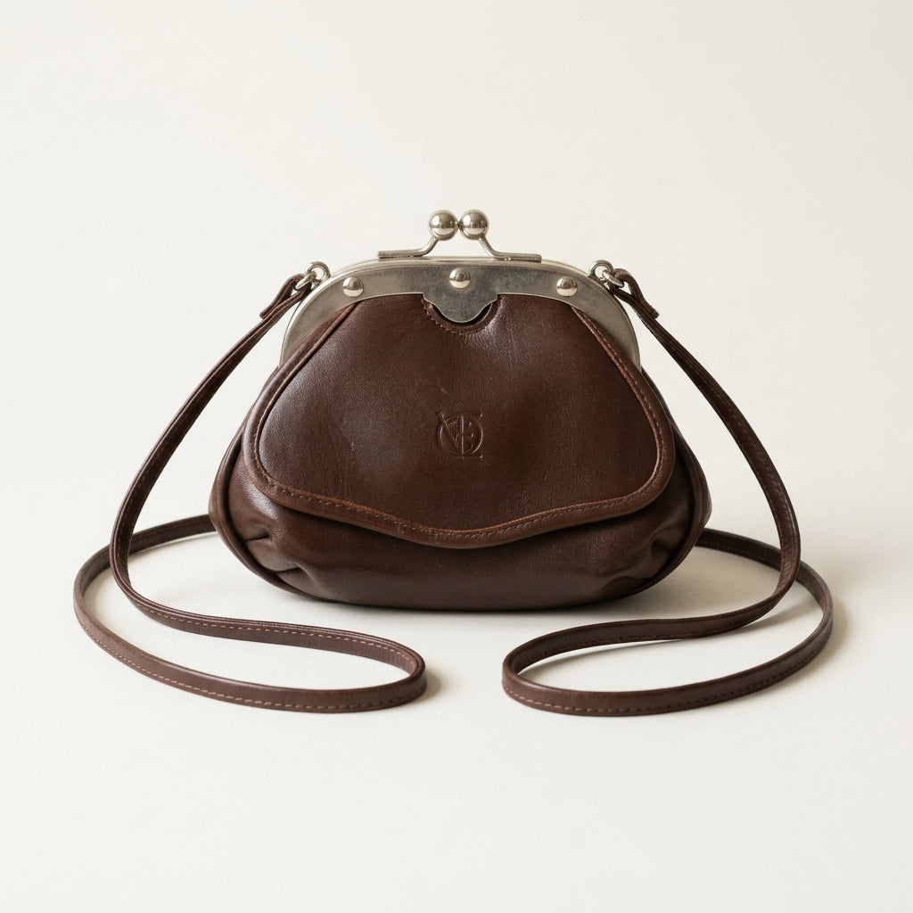 Vintage 1980s Brown Leather Kiss-Lock Crossbody Bag Silver-Tone Frame Small, studio front view